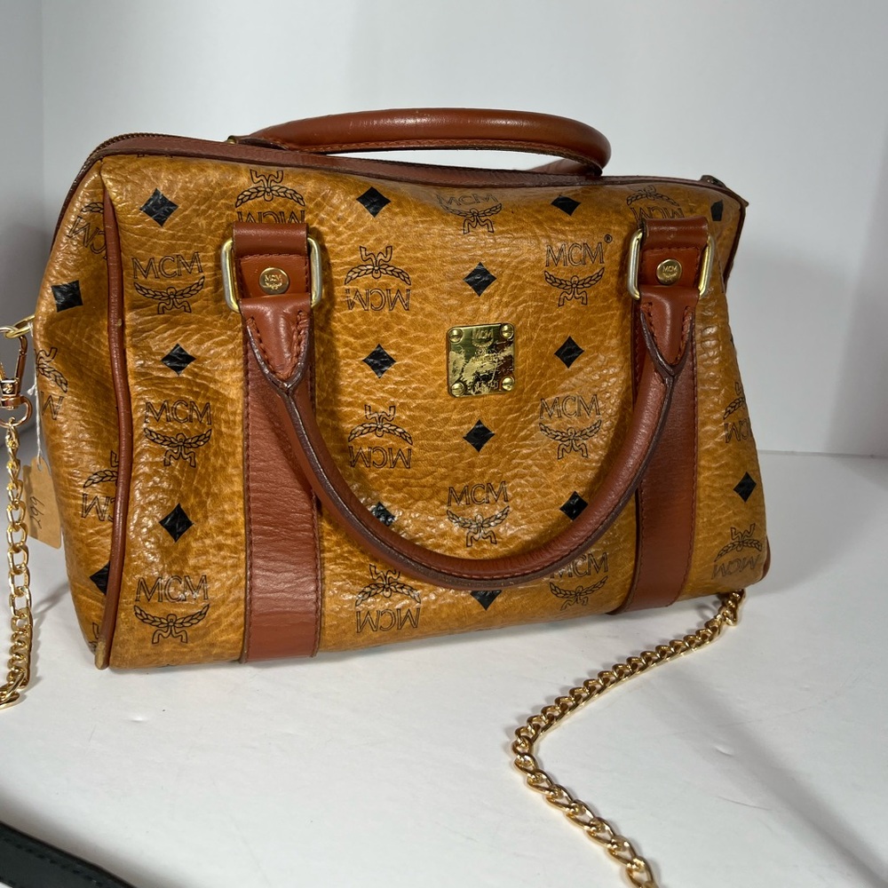 MCM shoulder bag. Coated canvas and leather trim. Chain is unbranded